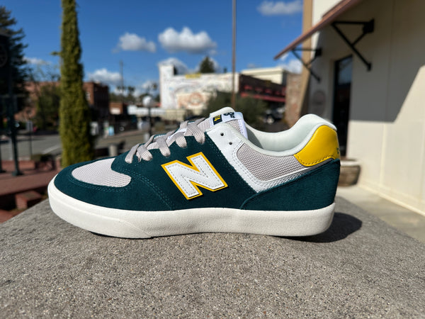 New balance 574 green and blue best sale